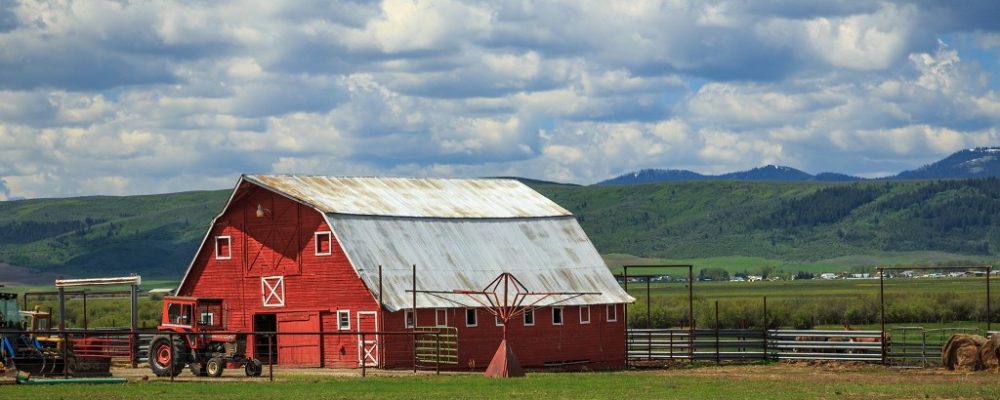Red barn near the mountains