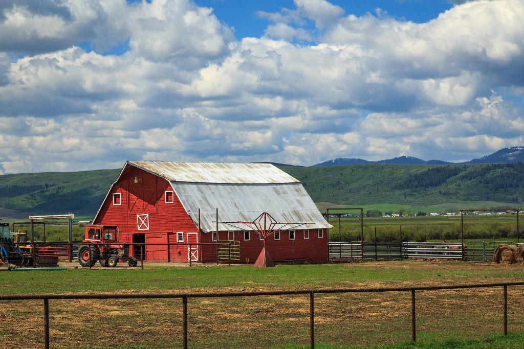 Red barn near the mountains