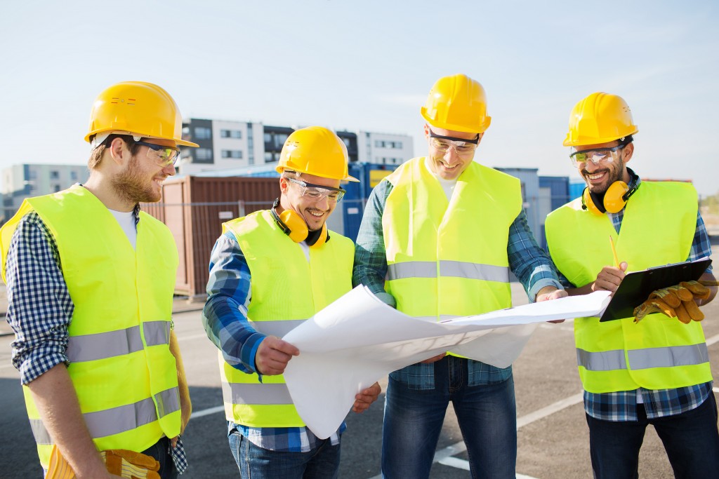 men wearing safety vest