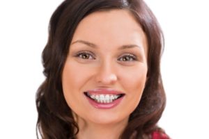 woman smiling with clear braces