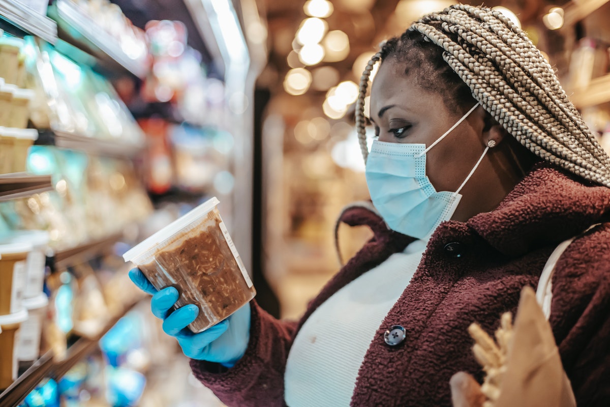 woman shopping wearing facemask