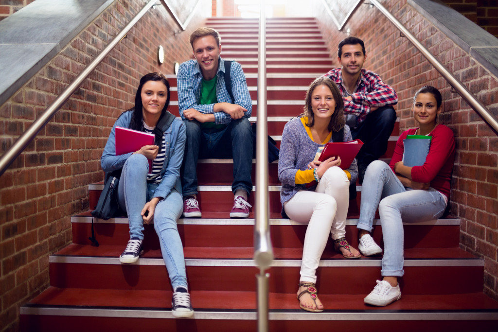 students sitting on the stairs